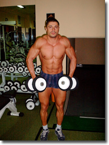 Fitness - Figura 84 - Shrug con Manubri